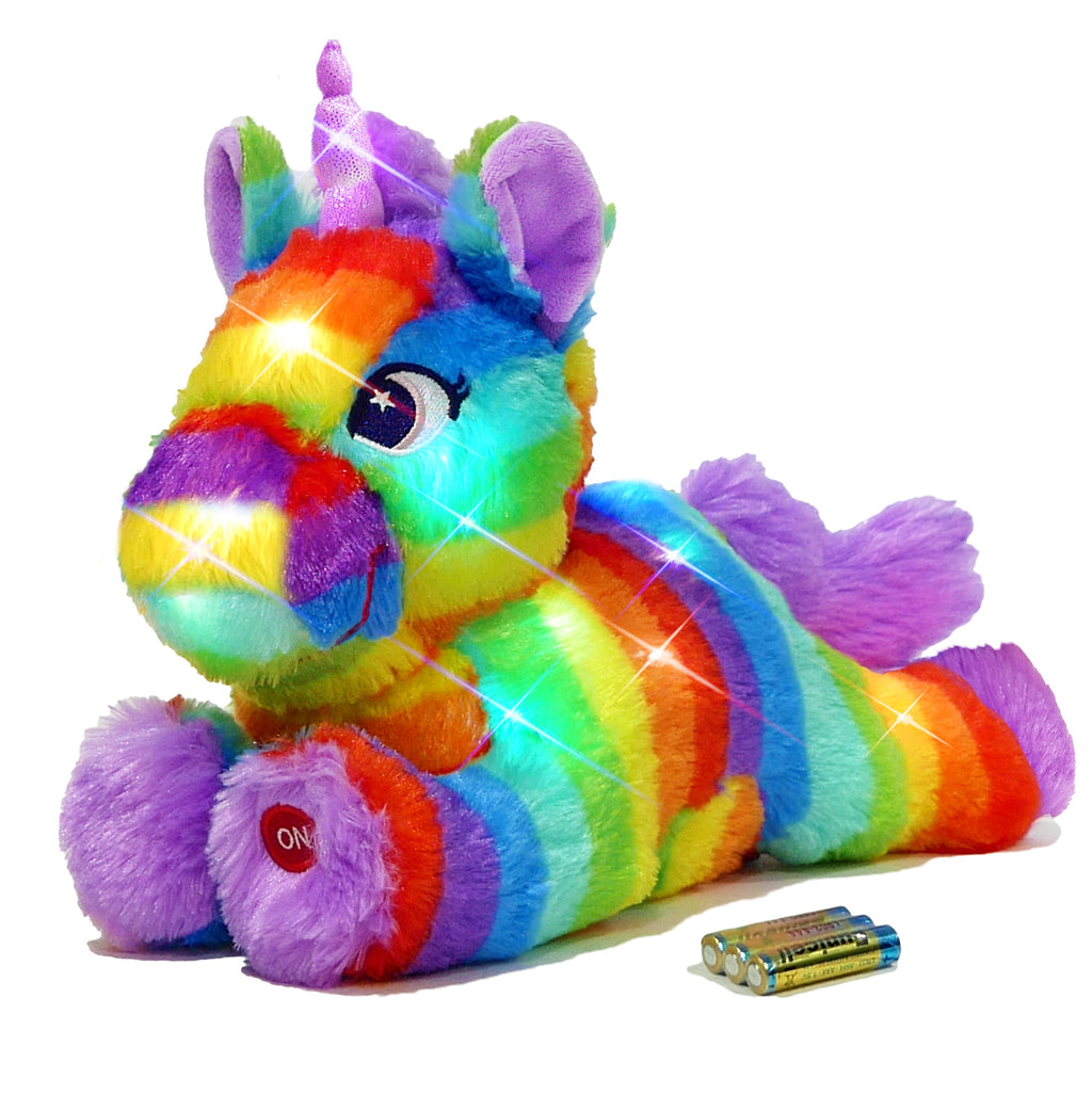 Rainbow unicorn LED plush glowing with sparkle effects, shown with three AAA batteries.
