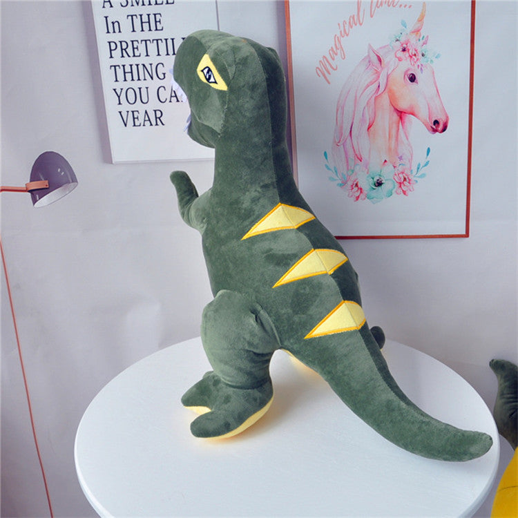 Side view of the dinosaur plush with reversible sequins