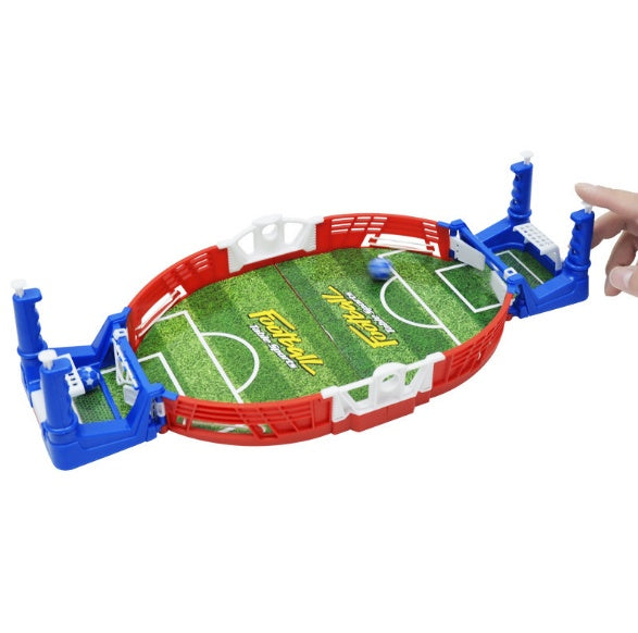 Tabletop football game box showing the assembled mini pitch
