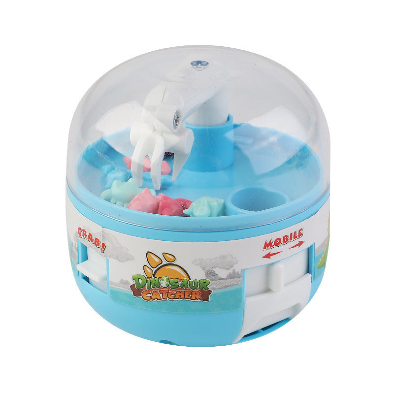 The mini dinosaur claw machine arcade game in playful arrangement