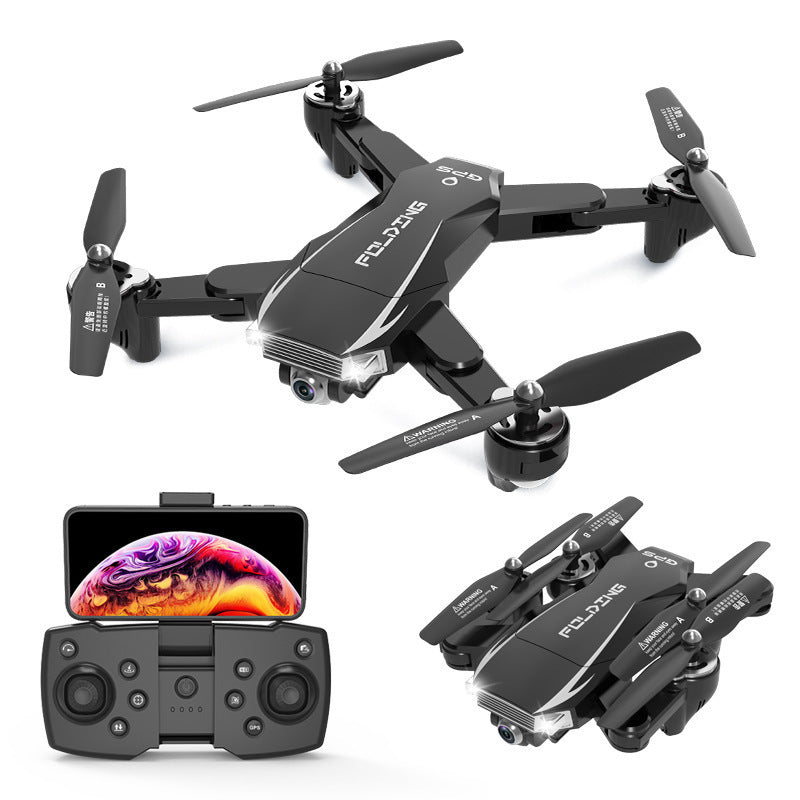 The 4K folding camera drone quadcopter in playful arrangement