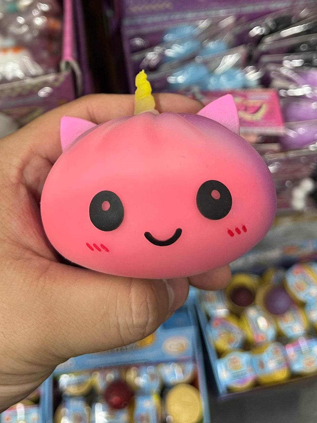 Rainbow Unicorn Mystery Dumpling Squishy Toy, Ages 3+ - product photo