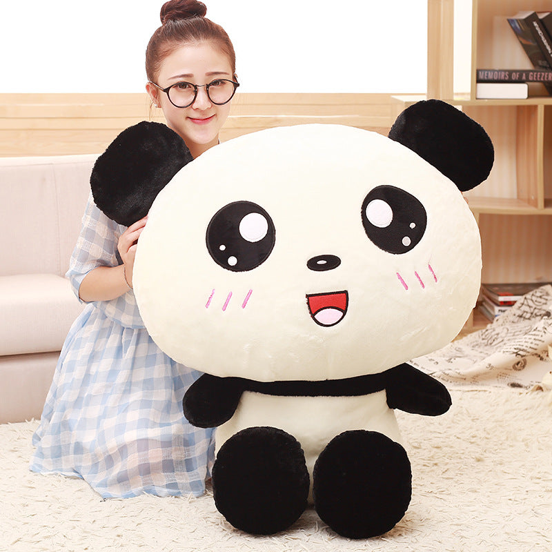 Giant 70 cm panda plush standing in a cozy living room