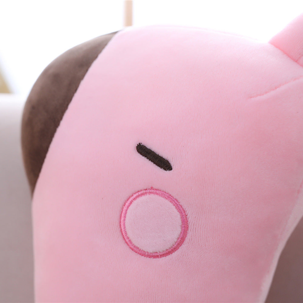 plump sika deer plush pillow arranged for display