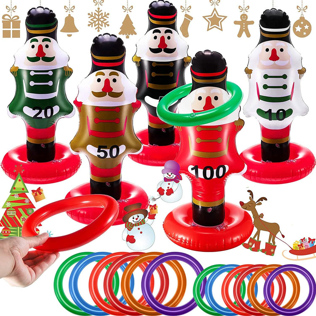 Five inflatable nutcracker ring toss targets with point values and colorful rings.