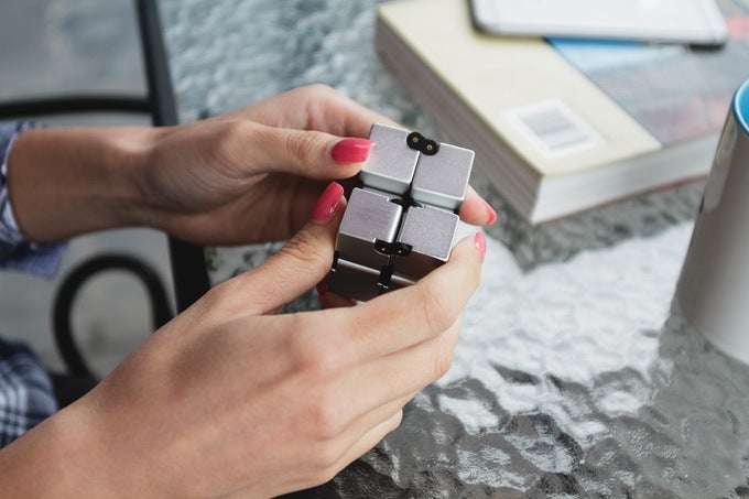 Side view of the alloy infinity cube fidget toy
