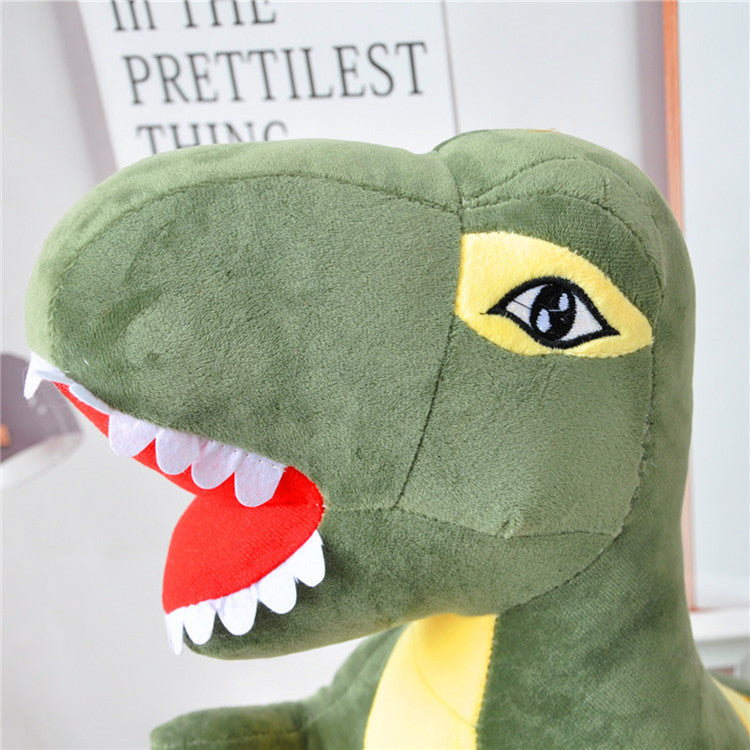 The dinosaur plush with reversible sequins shown in detail