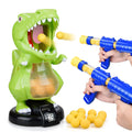 Green dinosaur target with blue foam-ball blaster and yellow balls