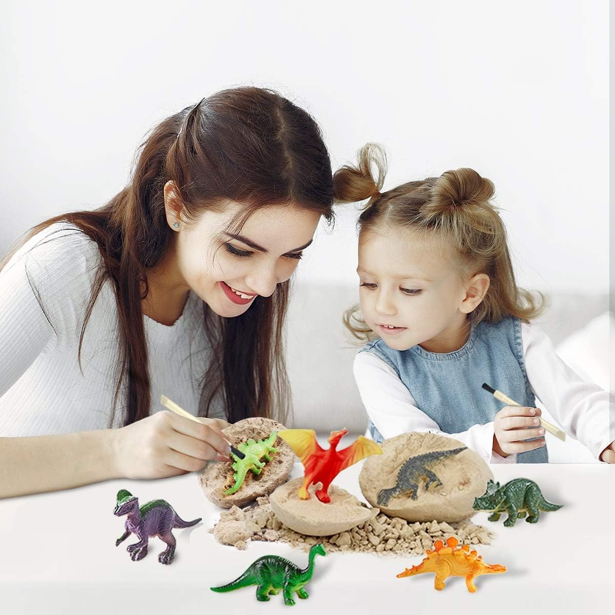 Dinosaur Egg Excavation Kit with 12 Dig Eggs & Mini Dinosaurs - product photo