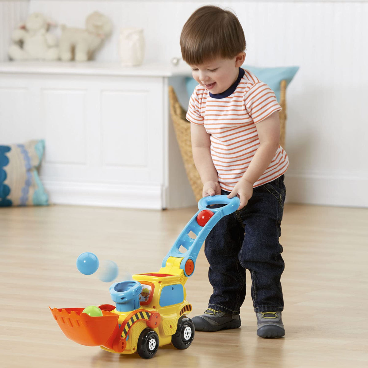 Push-and-Pop Bulldozer Toy with Ball Action, Colors & Sounds - product photo