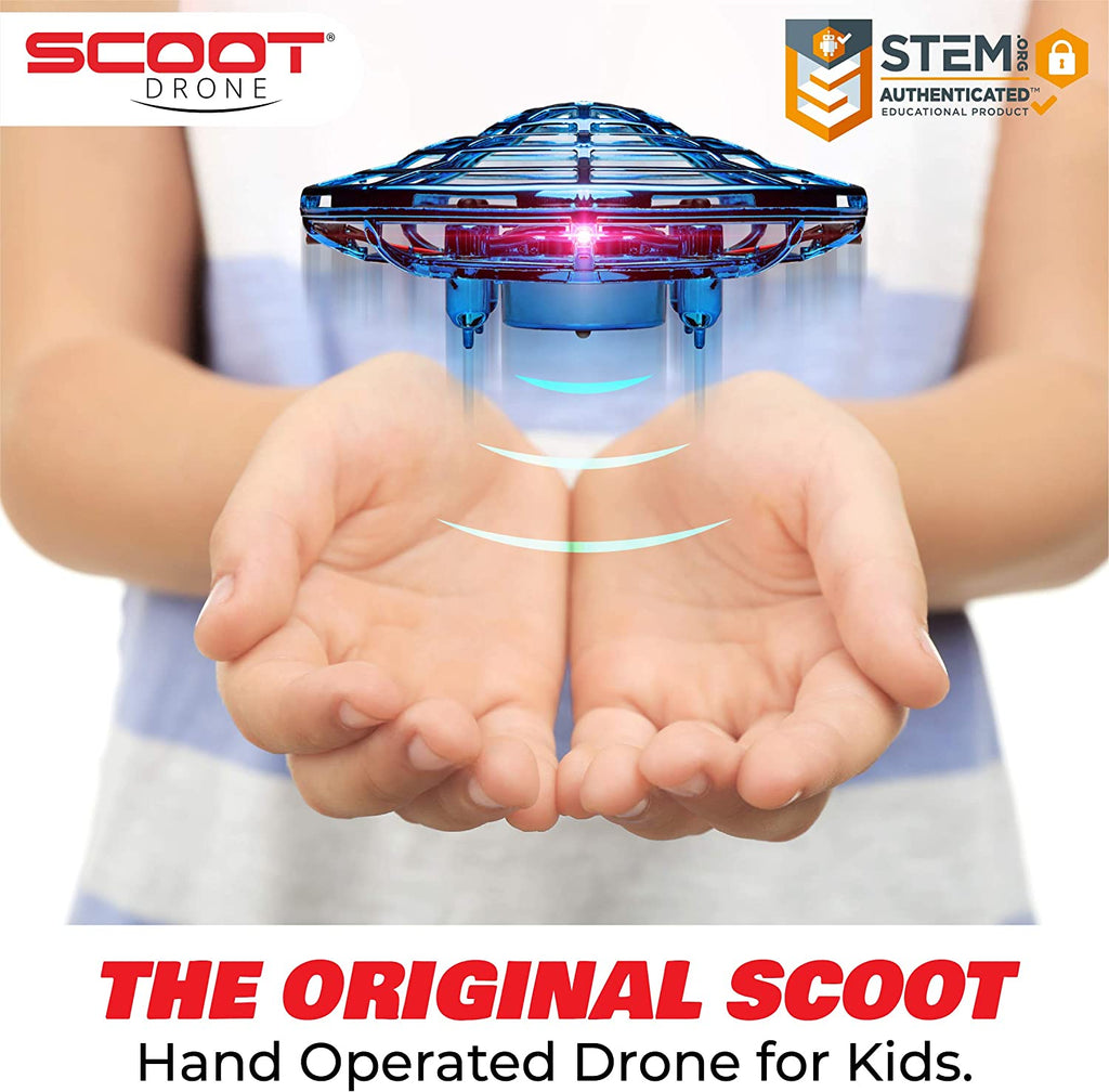 Scoot hand-operated flying saucer hovering over an open palm