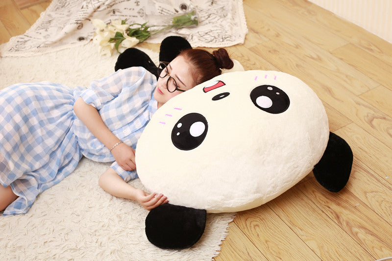 Oversized panda plush with a big round head and cheerful smile