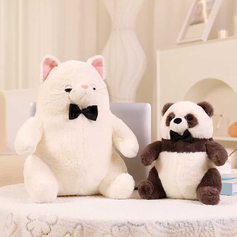 Pink pig plush with a black bow tie from the plush animal set
