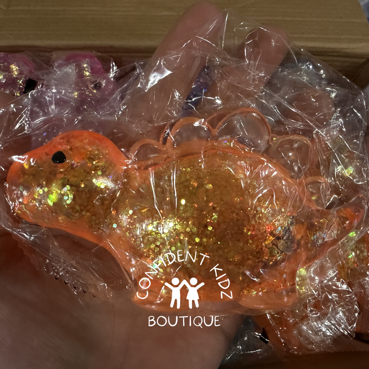 Glitter Dinosaur Slow-Rise Squishy Sensory Toy, Ages 3+