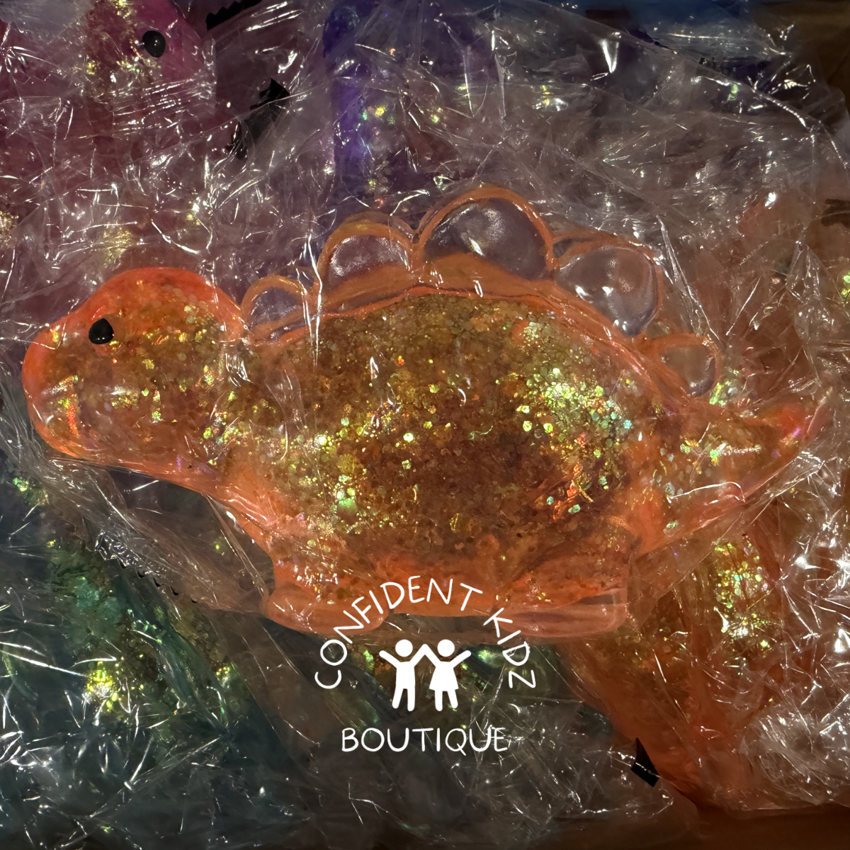 Glitter Dinosaur Slow-Rise Squishy Sensory Toy, Ages 3+