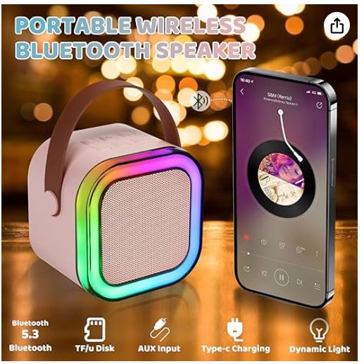 Pink karaoke speaker next to a phone showing Bluetooth, TF card, AUX, Type-C, and light icons.