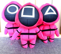 Pink masked character plush toys with circle, square and triangle symbols