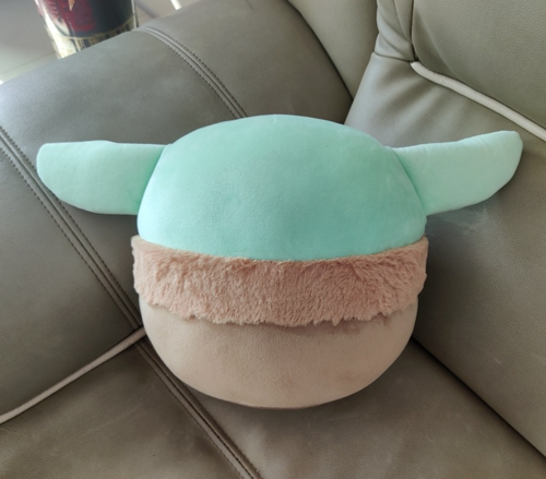 Rear view of green-eared plush and tan robe