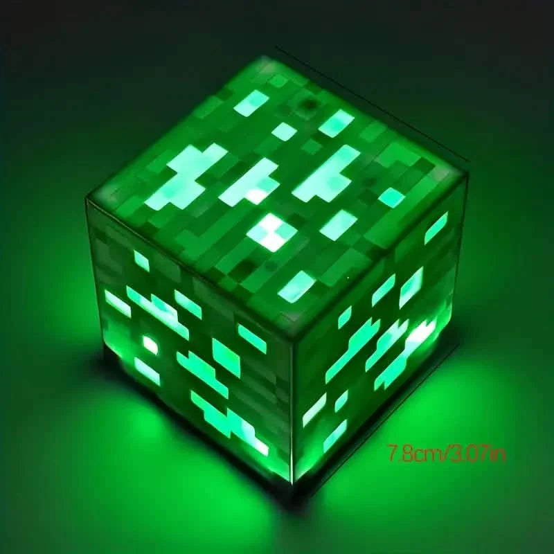 Glowing green pixel ore block night light with 7.8 cm size marking.