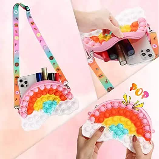 Pop-it shoulder bag opened to show a phone inside, with hands pressing the bubbles.