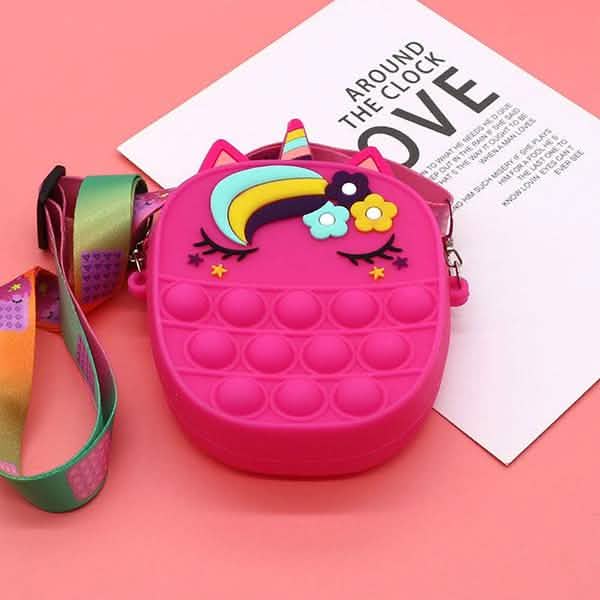 Close-up view of the unicorn pop-it crossbody purse